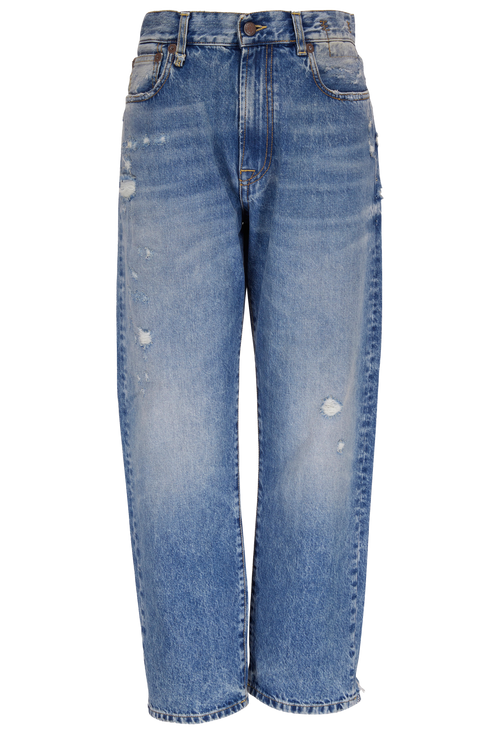 Blue jeans with slight distressing on a white background