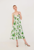 Woman wearing a floral dress on a white background