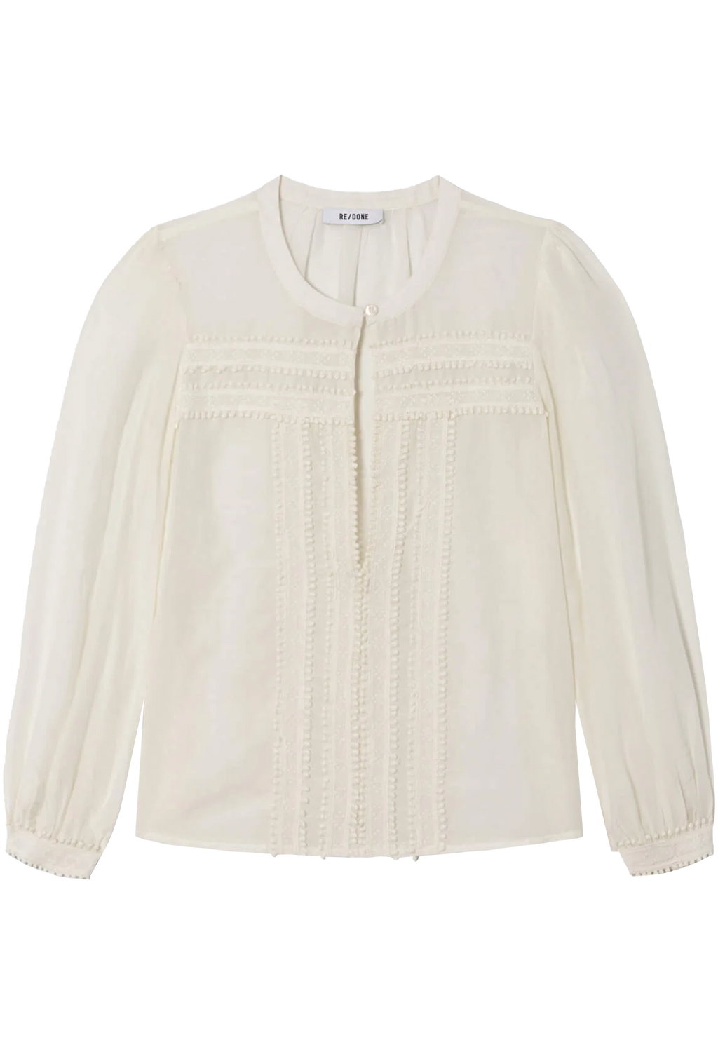 White blouse with smocked details on a white background