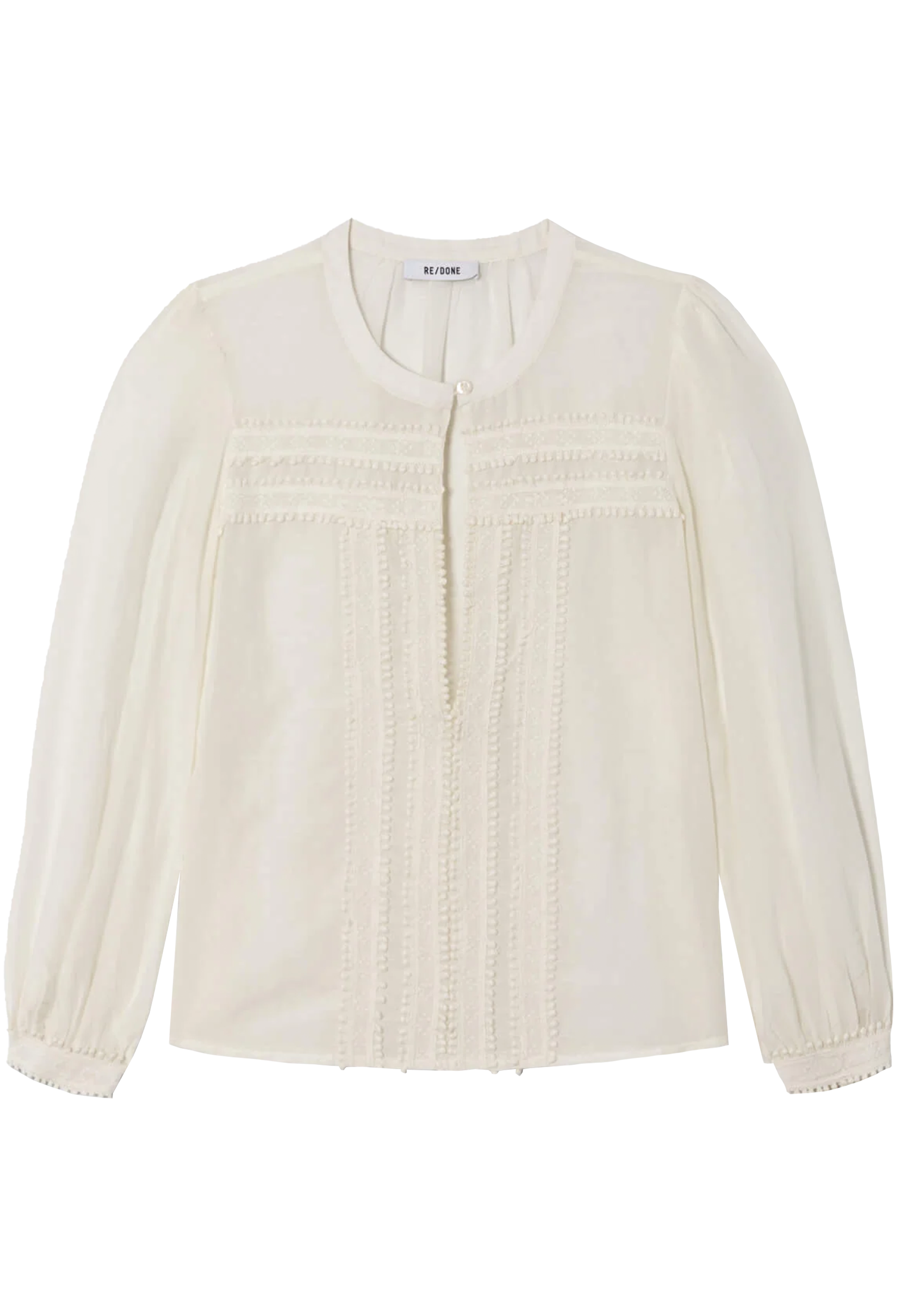 White blouse with smocked details on a white background