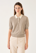 Woman wearing a striped shirt with a white collar against a plain background