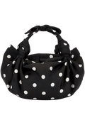 Black polka dot bag with a bow on a white background