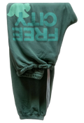 Green sweatpants with 'FREE CITY' text on a white background