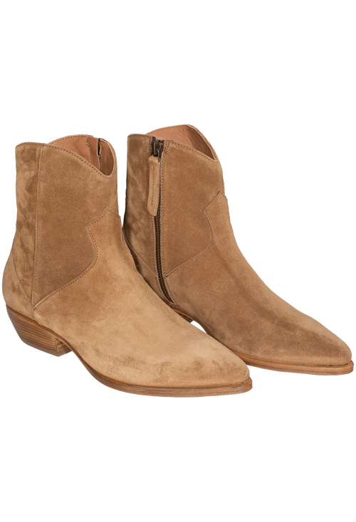Pair of brown suede ankle boots on a white background
