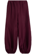 Maroon pants on a white background