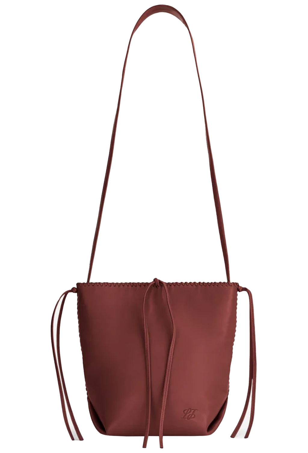 red leather handbag with a long strap on a white background