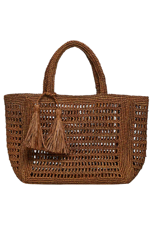 Brown woven handbag with tassels on a white background
