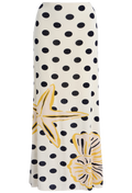 Skirt with polka dot pattern and yellow floral design on a white background