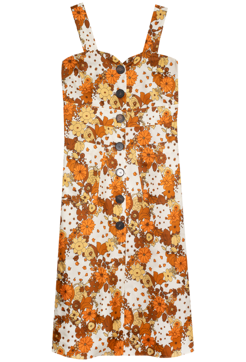 Floral dress with orange and white pattern on a white background