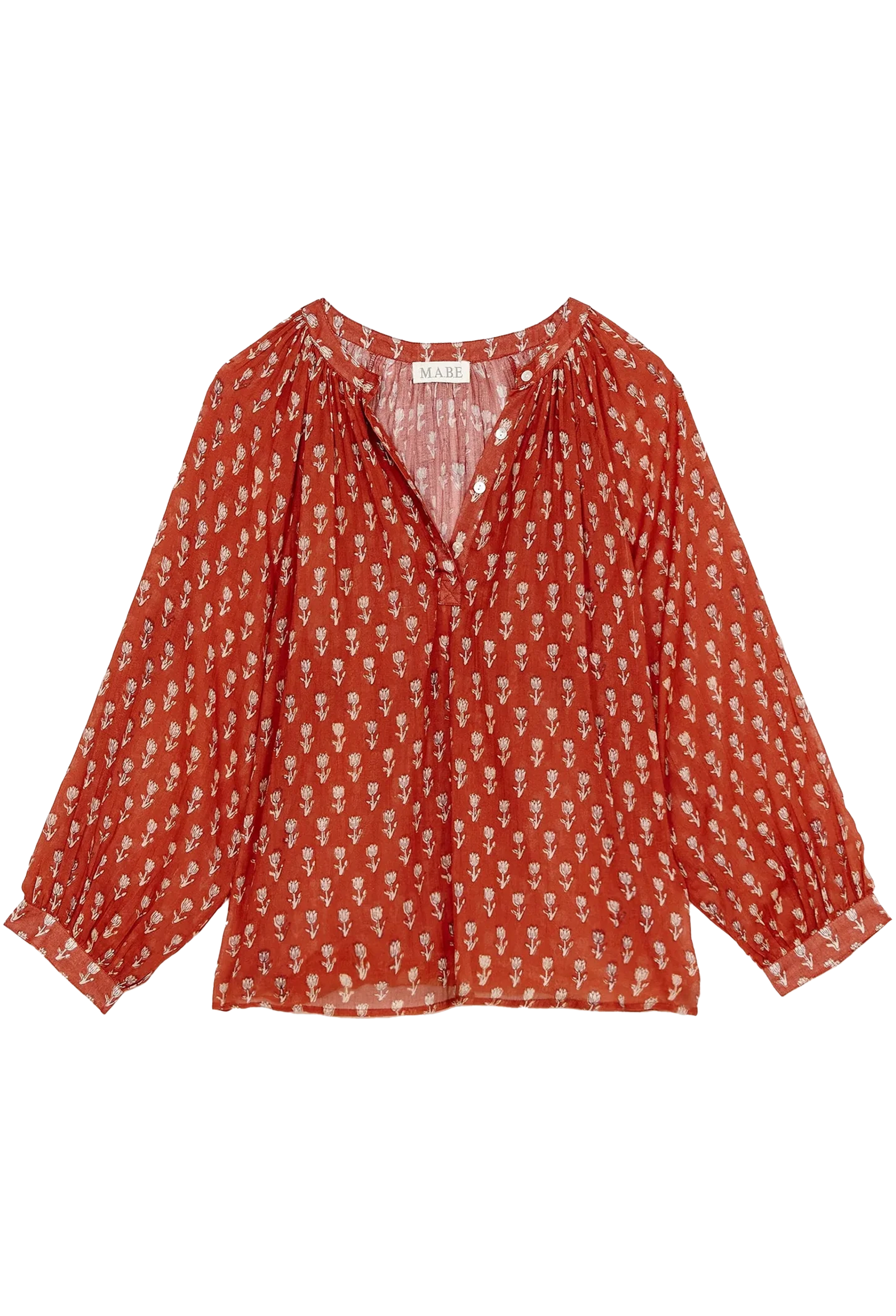 Red patterned blouse on a white background