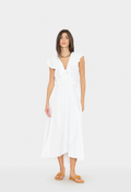 Woman wearing a white dress on a white background