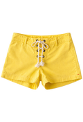 Yellow shorts with lace-up front on a white background