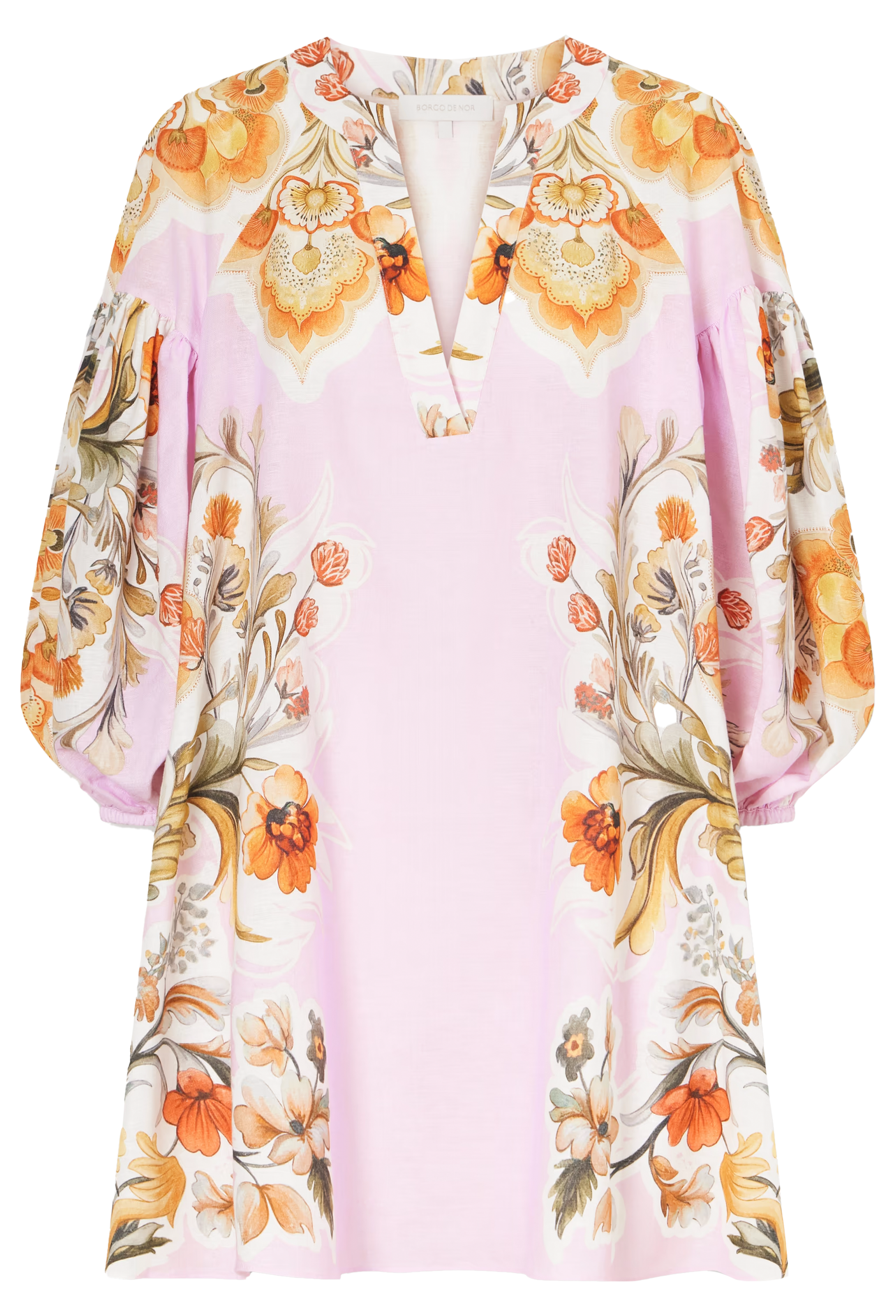 Floral patterned blouse with long sleeves on a light pink background