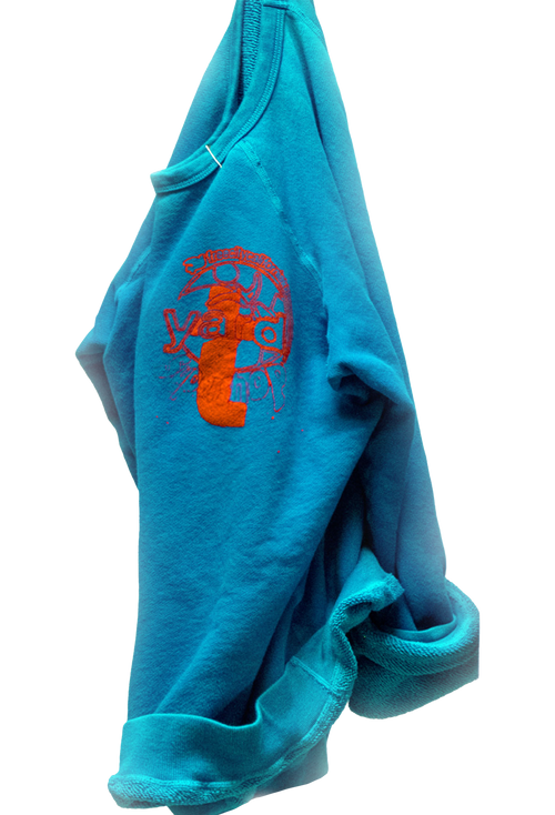 Blue sweatshirt with orange graphic design on a white background