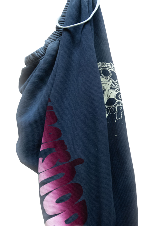 blue sweatpant with pink text and white graphic on a white background