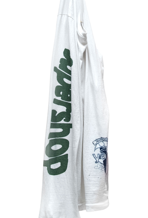 White t-shirt with green text and a logo on a white background
