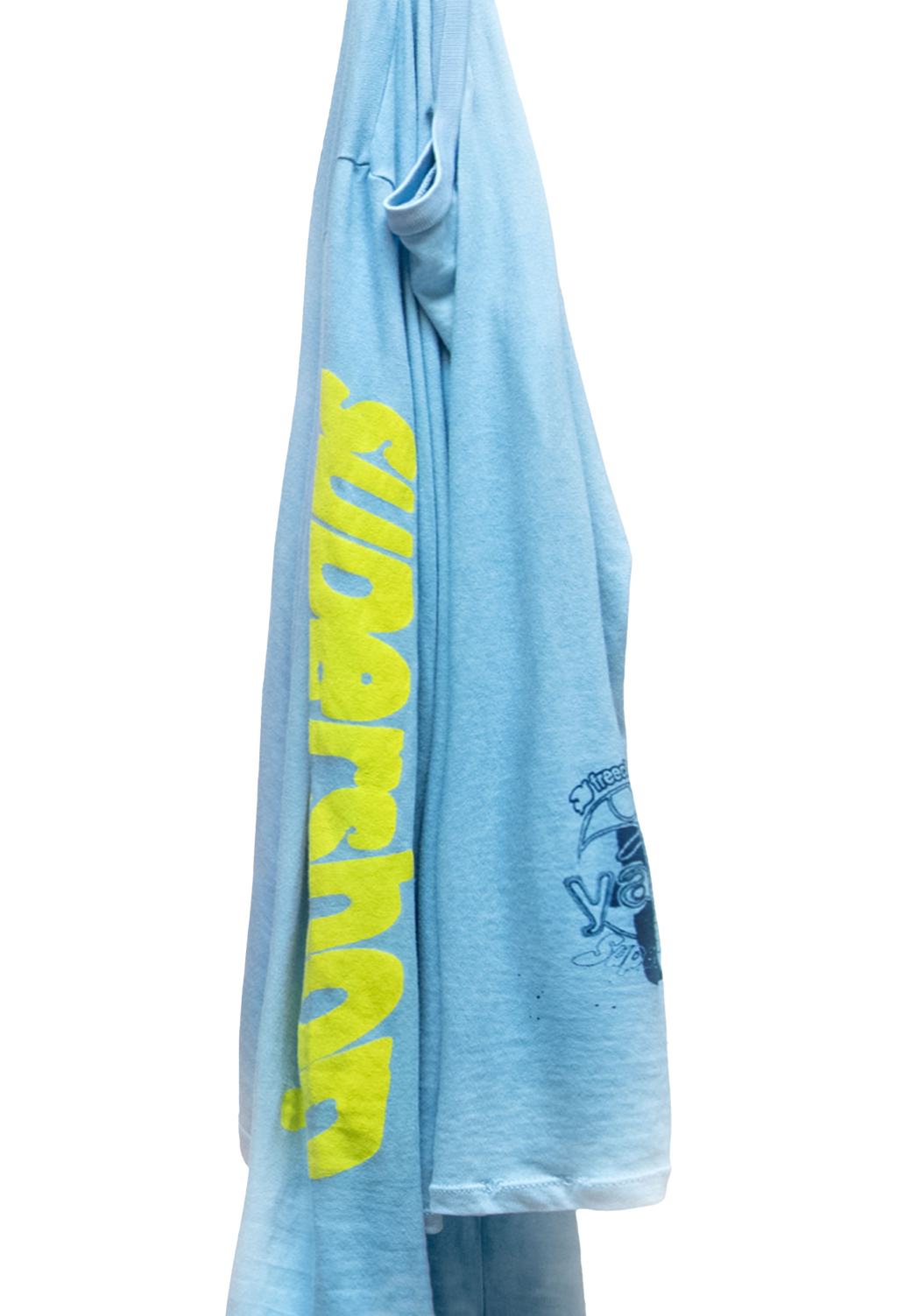 Light blue t-shirt with yellow text and graphics on a white background