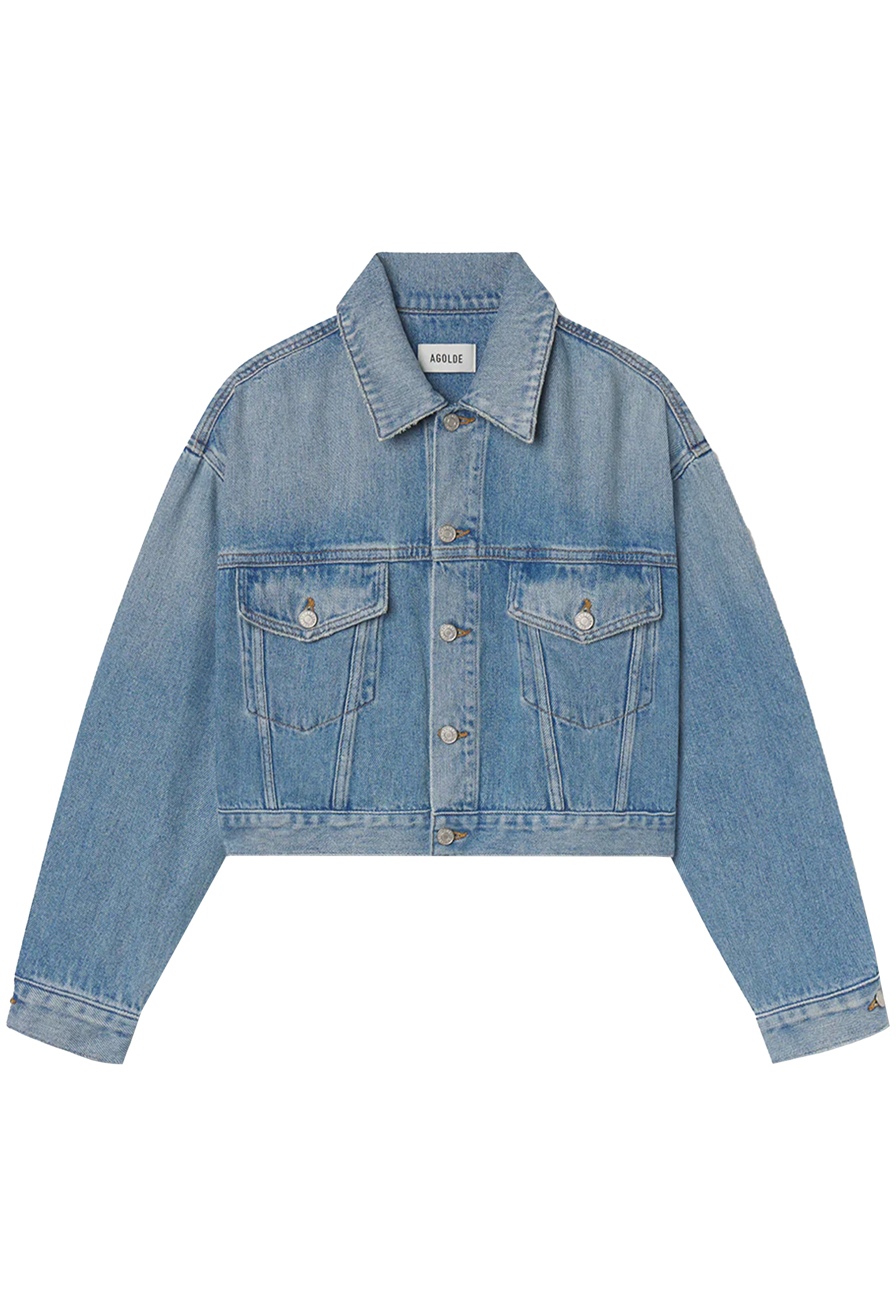 model wearing jeans and a denim jacket on a white background