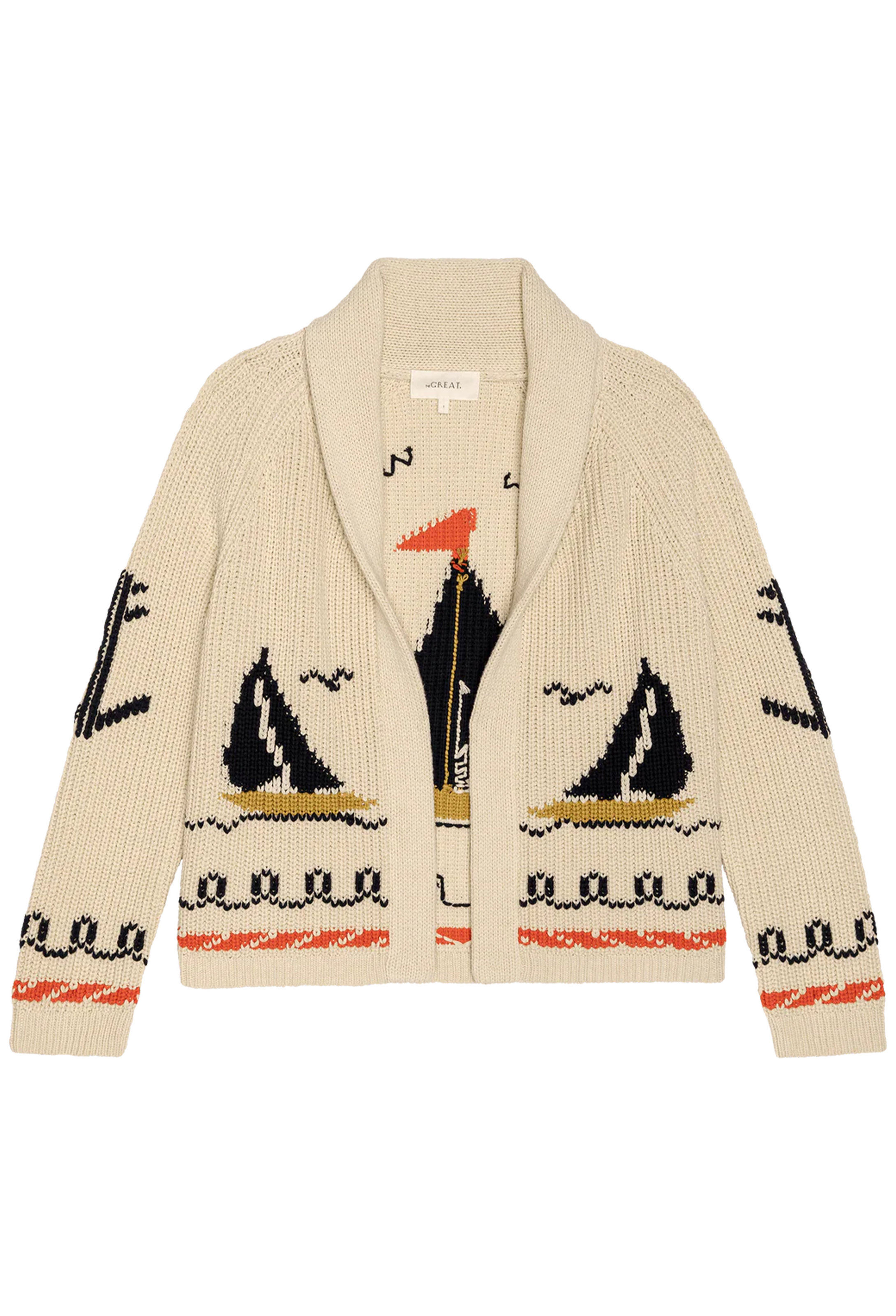 beige cardigan with embroidered sailboat motifs on a white background