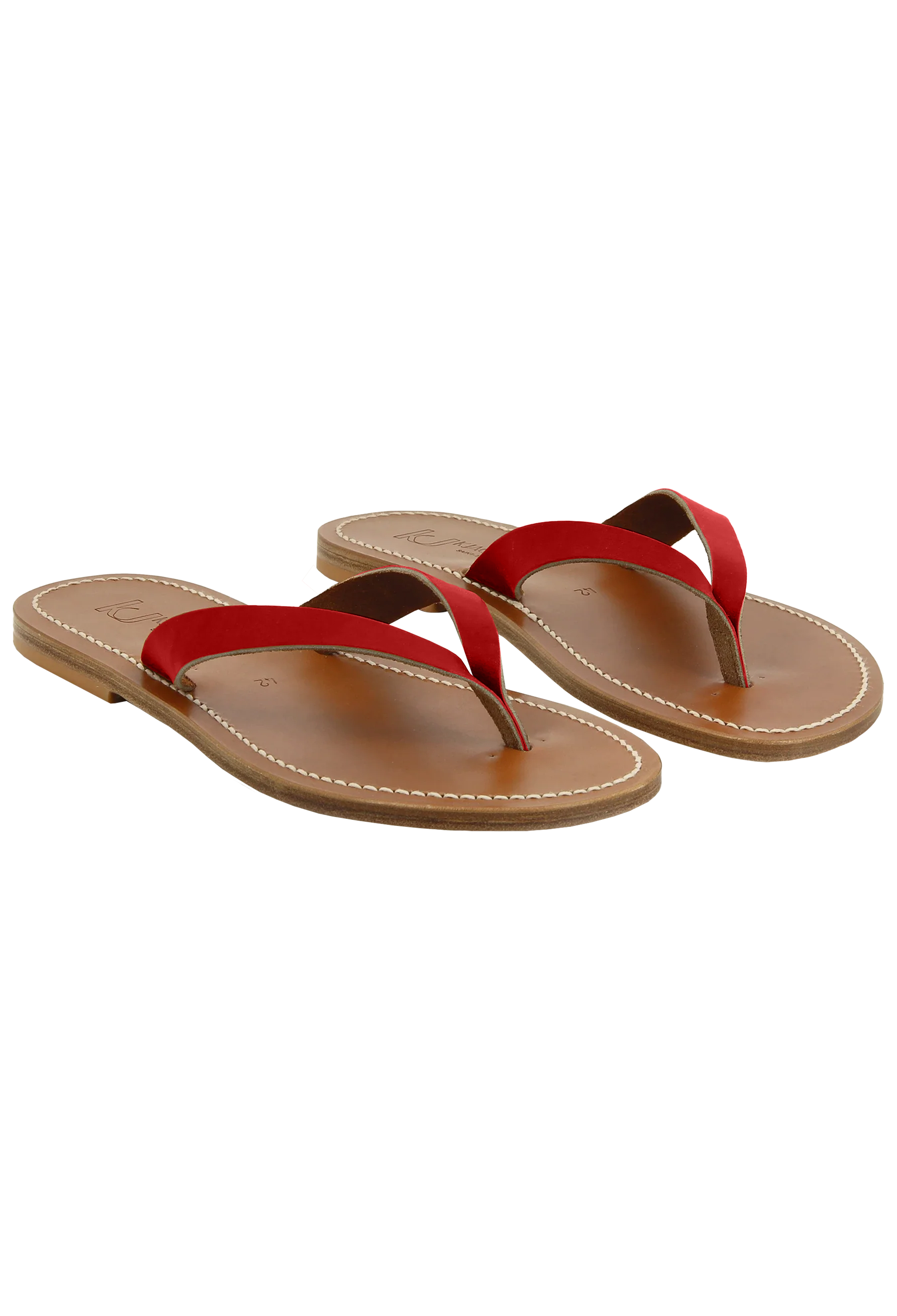 Pair of red and brown sandals on a white background