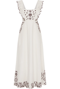 White dress with floral embroidery on a white background