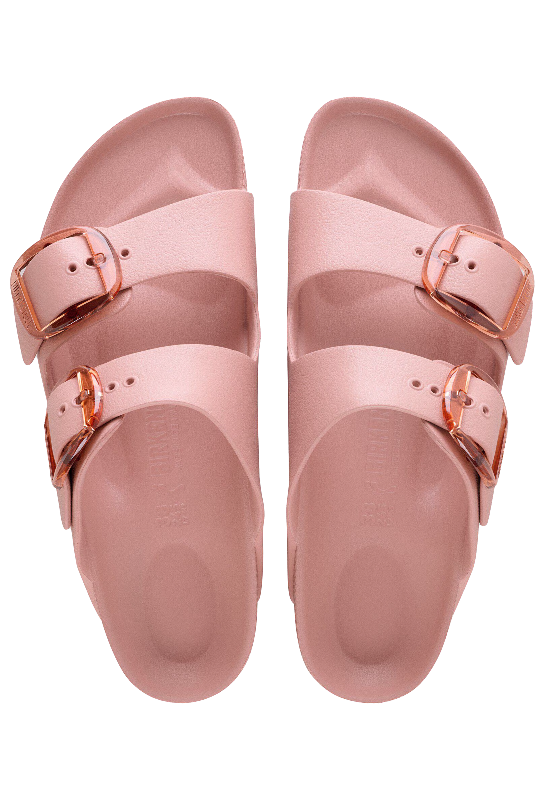 Pair of pink sandals with gold buckles on a transparent background