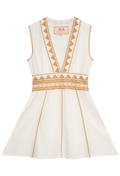 White dress with gold embroidery on a white background