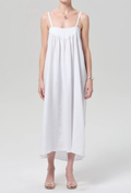 White dress worn by a person on a white background