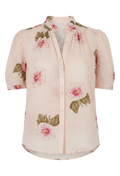 Floral patterned blouse on a white background
