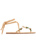 Beige sandal with bead embellishments on a white background