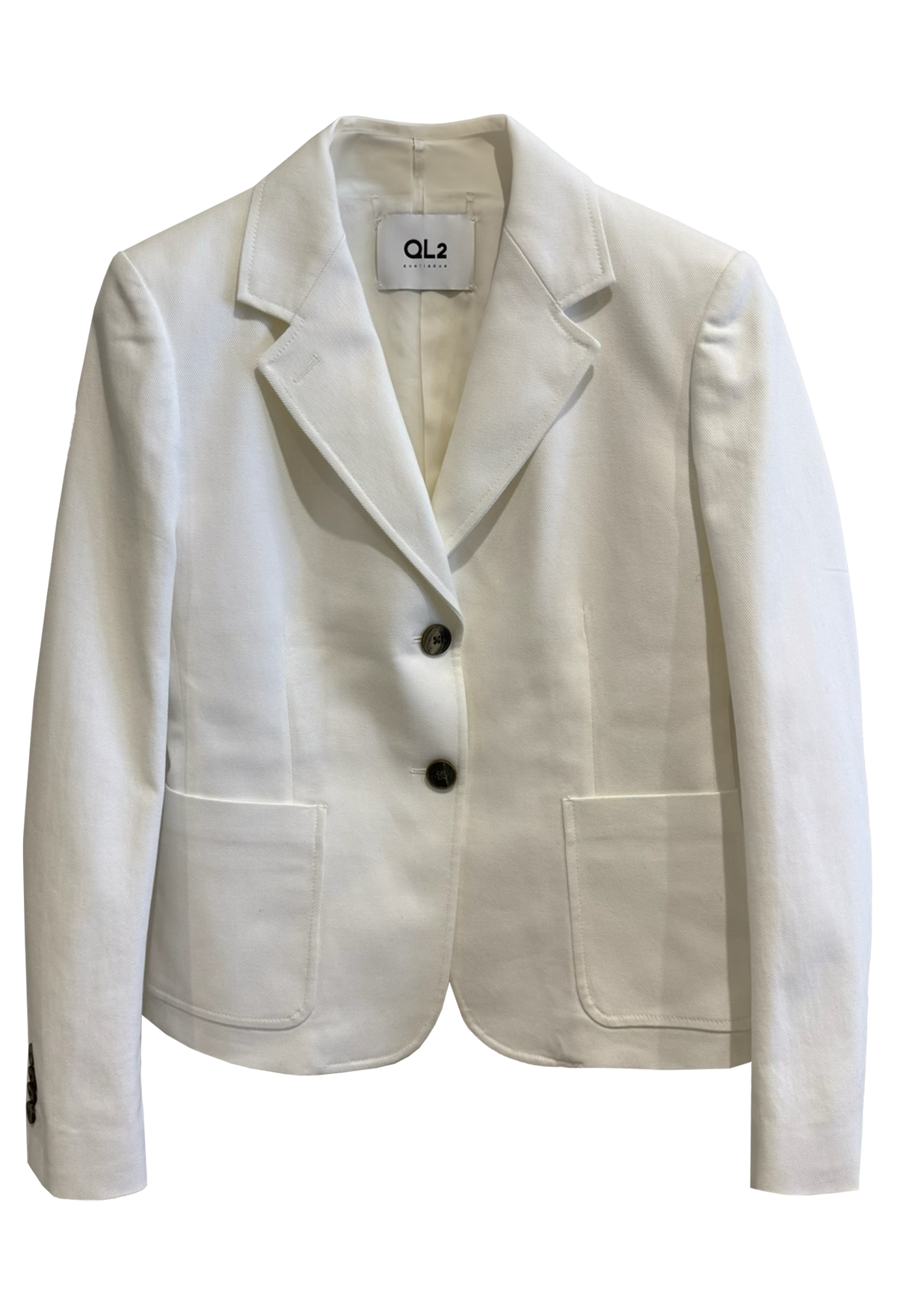 White blazer with a button on a white background