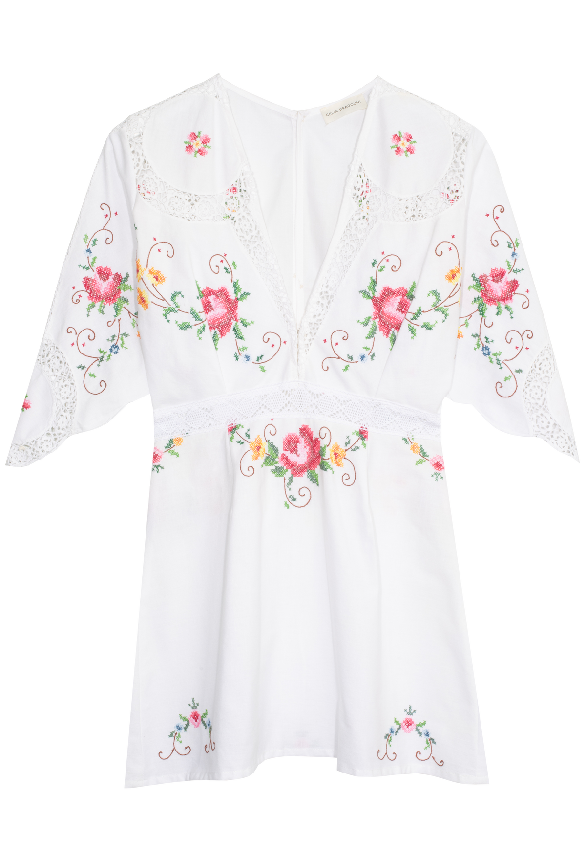White short-sleeve embroidered dress with pink and orange floral motifs and green leaves, featuring a split neckline and lace trim on the sleeves.