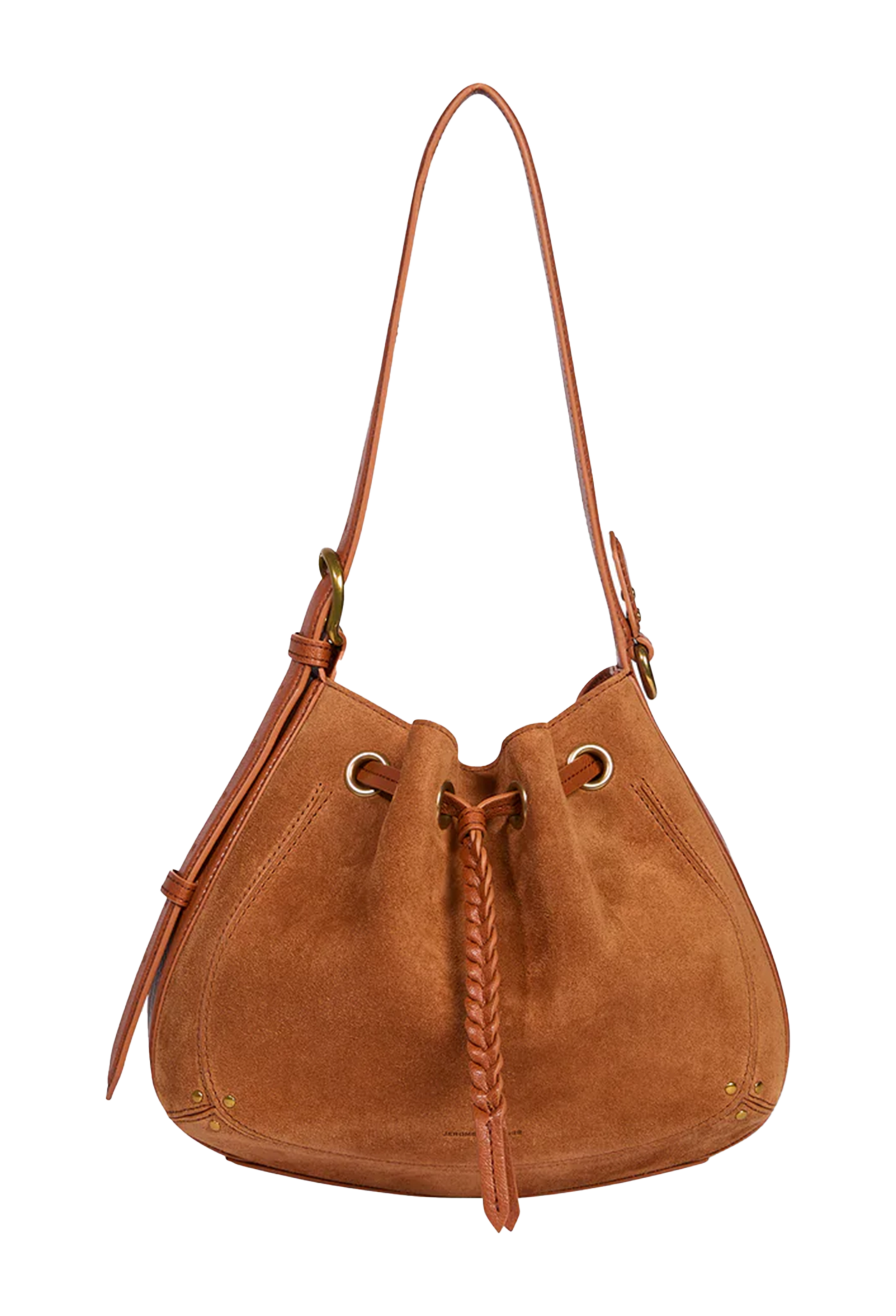 A tan suede drawstring bucket bag with a single shoulder strap, gold-tone hardware, and a braided leather tassel, shown against a plain white background.