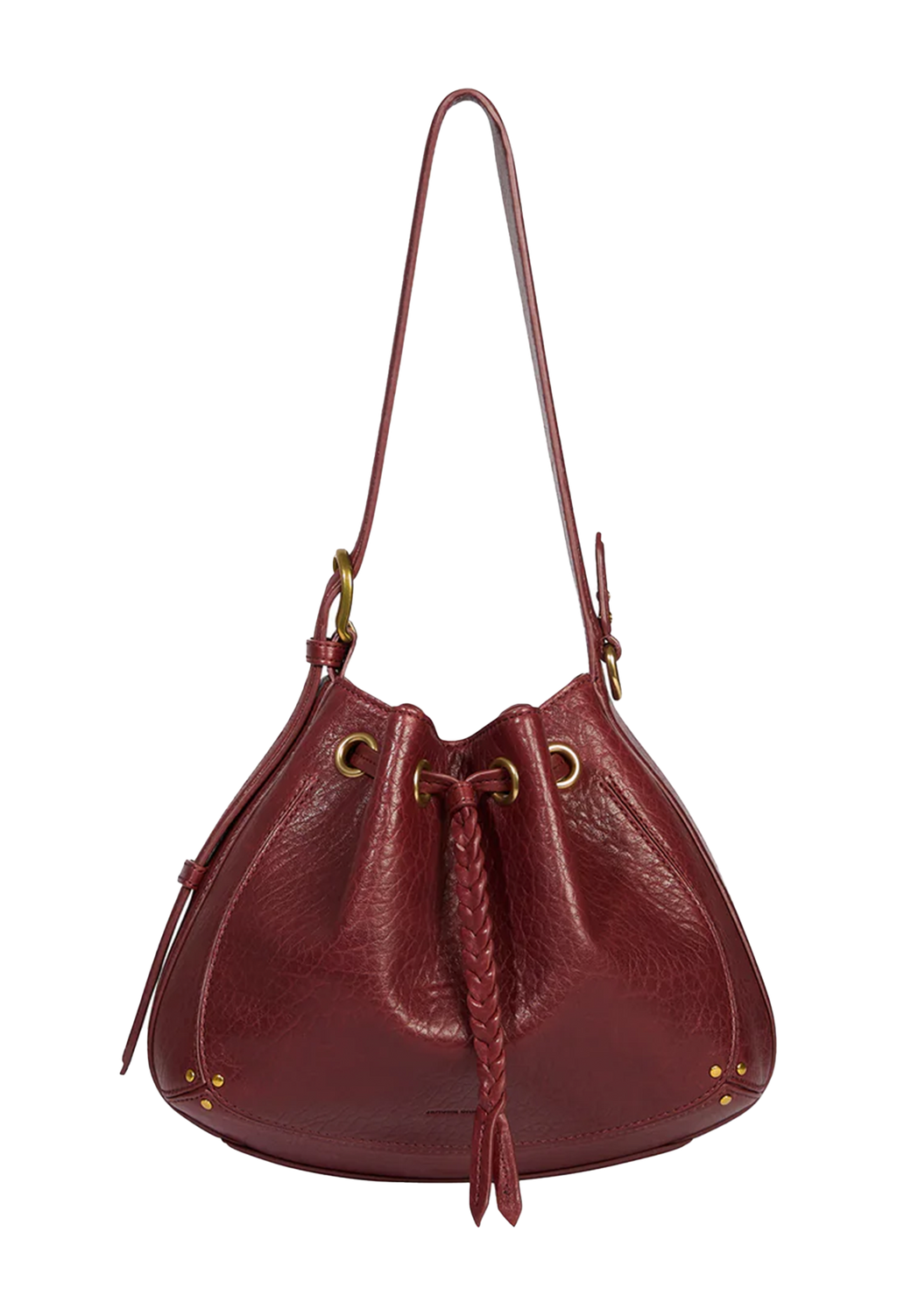 A burgundy pebbled leather bucket bag with a braided leather tassel, gold-tone hardware, and a single shoulder strap, shown against a plain white background.