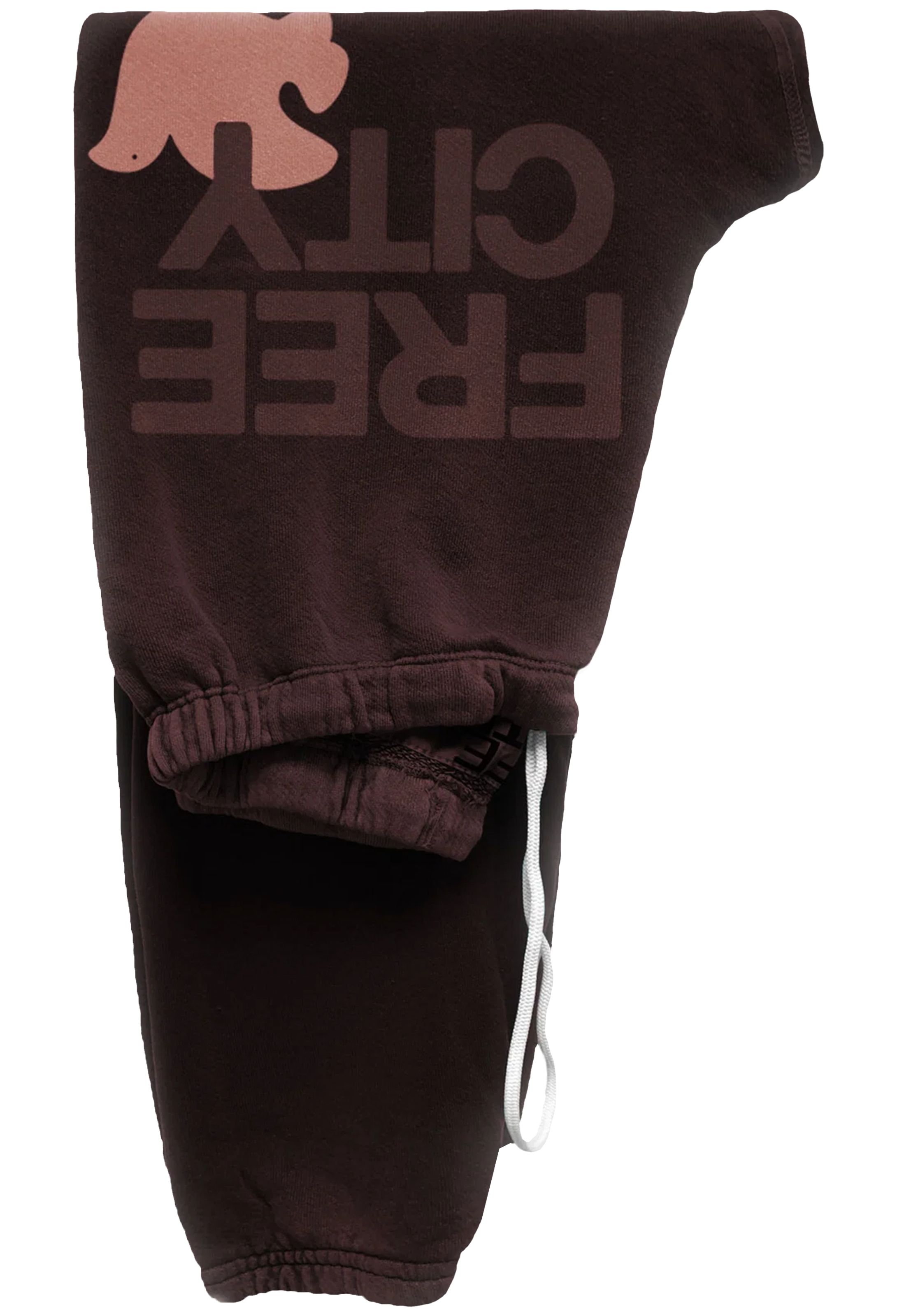 Dark brown sweatpants featuring a large tonal 'FREE CITY' text graphic and a pink dove logo on the upper leg, with an elastic waistband and white drawstring.