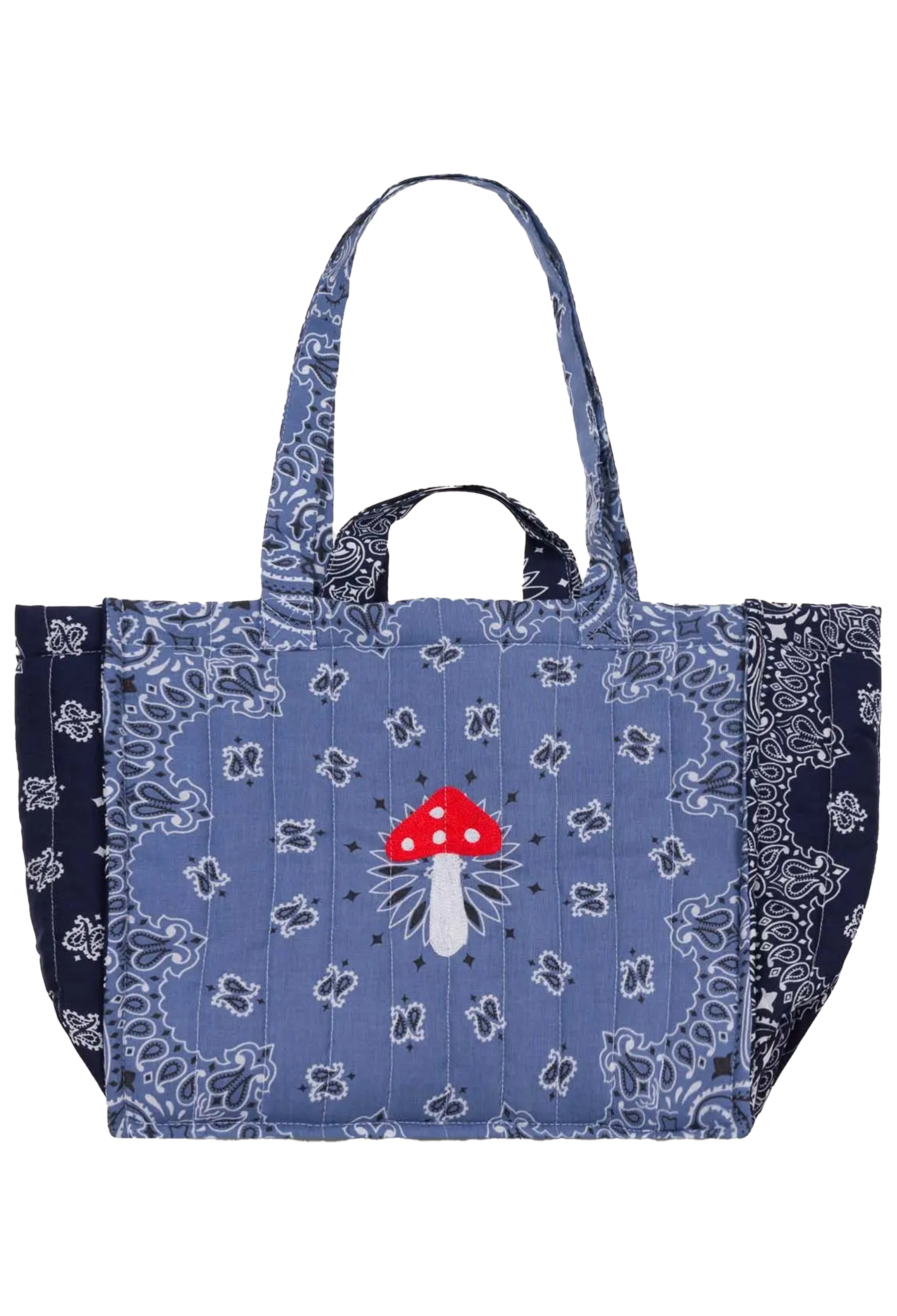 A quilted tote bag featuring a blue bandana print with a central red and white mushroom design, set against a plain white background.