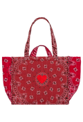 A red quilted tote bag featuring a bandana paisley pattern and a central red heart design, shown against a plain white background.
