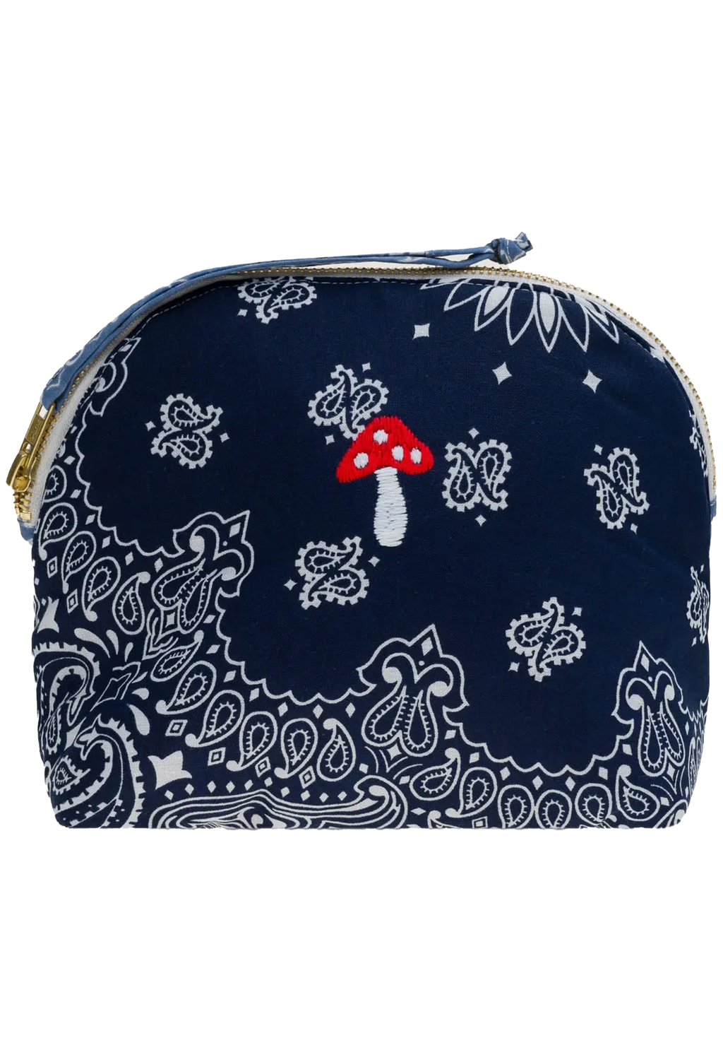 A small zippered pouch or cosmetic bag in navy blue bandana fabric with white paisley and floral motifs, plus a small embroidered red-and-white mushroom on the front.