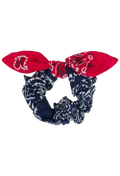 A two-piece hair accessory set featuring a red and navy blue paisley bandana tie headband and a matching scrunchie, displayed on a solid white background.