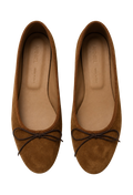 A pair of brown suede ballet flats with dark brown ribbon bows on the toes, shown from a top-down view on a white background. The insoles are tan and feature the brand name 'ANNIEL' printed inside.