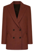 A double-breasted blazer in a warm rust brown color, featuring notched lapels, a six-button front closure, and curved welt pockets, shown against a plain white background.