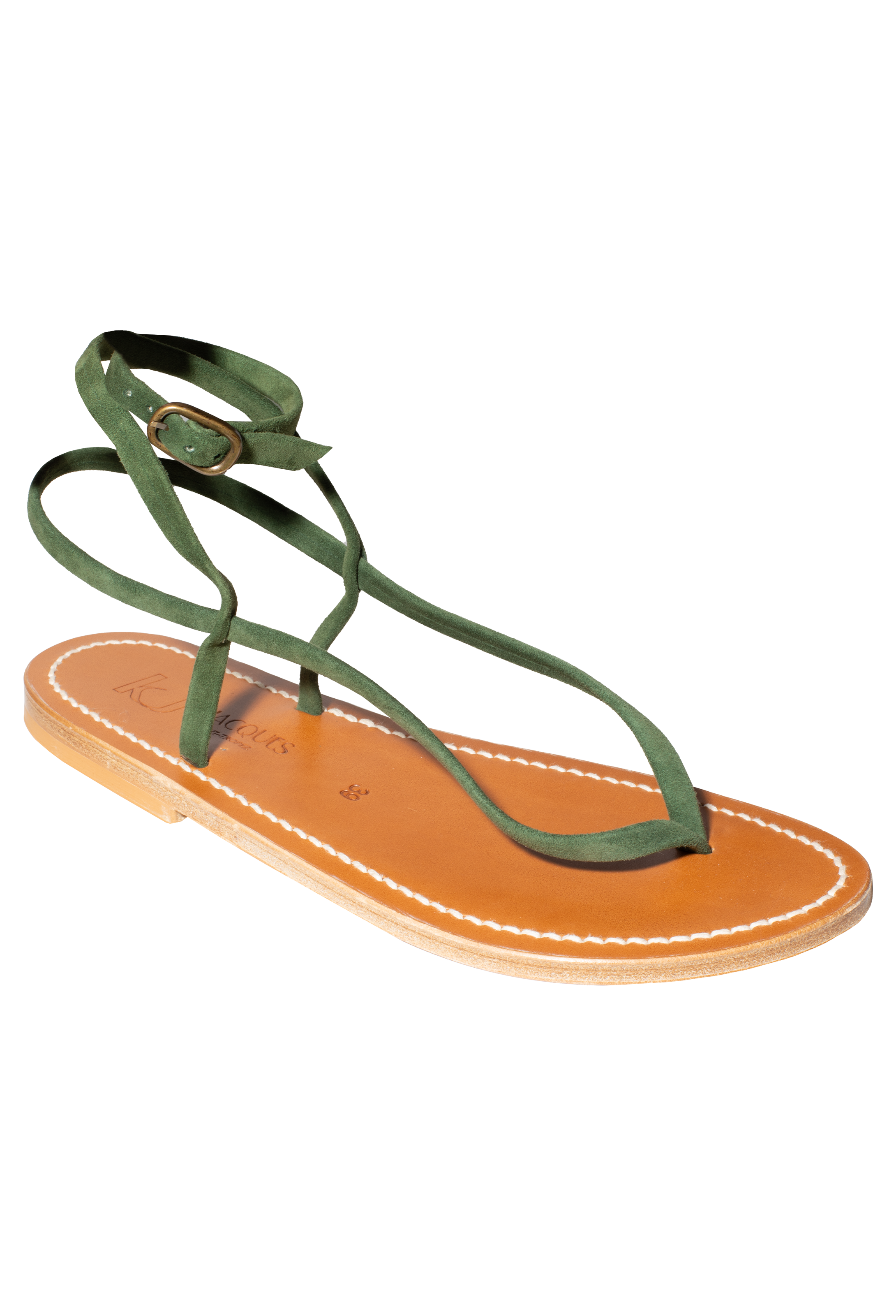 Green strap thong sandal with small gold ankle buckle and tan footbed. Set against a checkered background. 