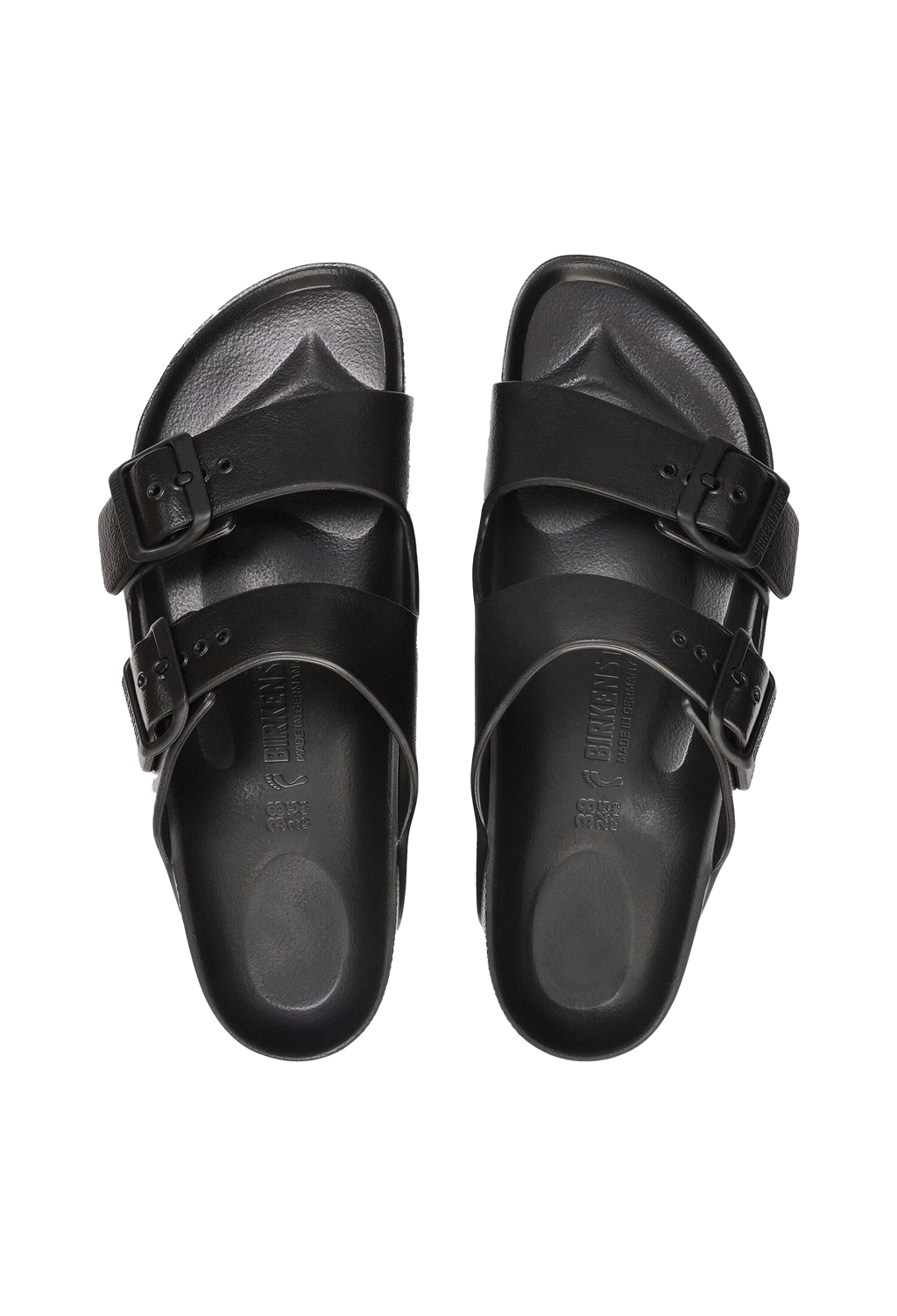 A pair of all-black two strap buckle sandals. Transparent background