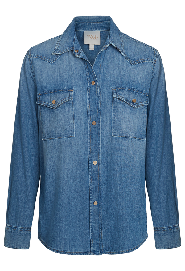 A denim shirt with snap buttons and flap pockets. Transparent background.