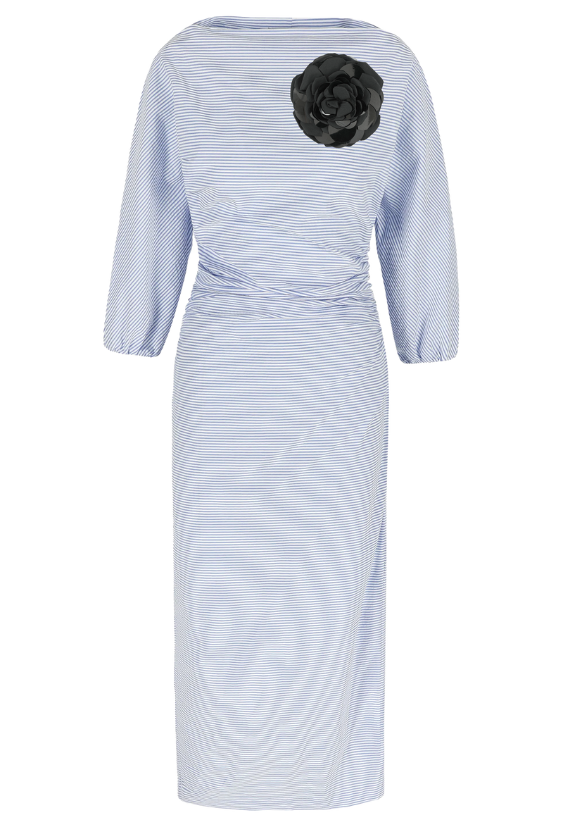 A long sleeved cinched waist long dress with blue and white stripes and a large black flower brooch near the shoulder. Transparent background.