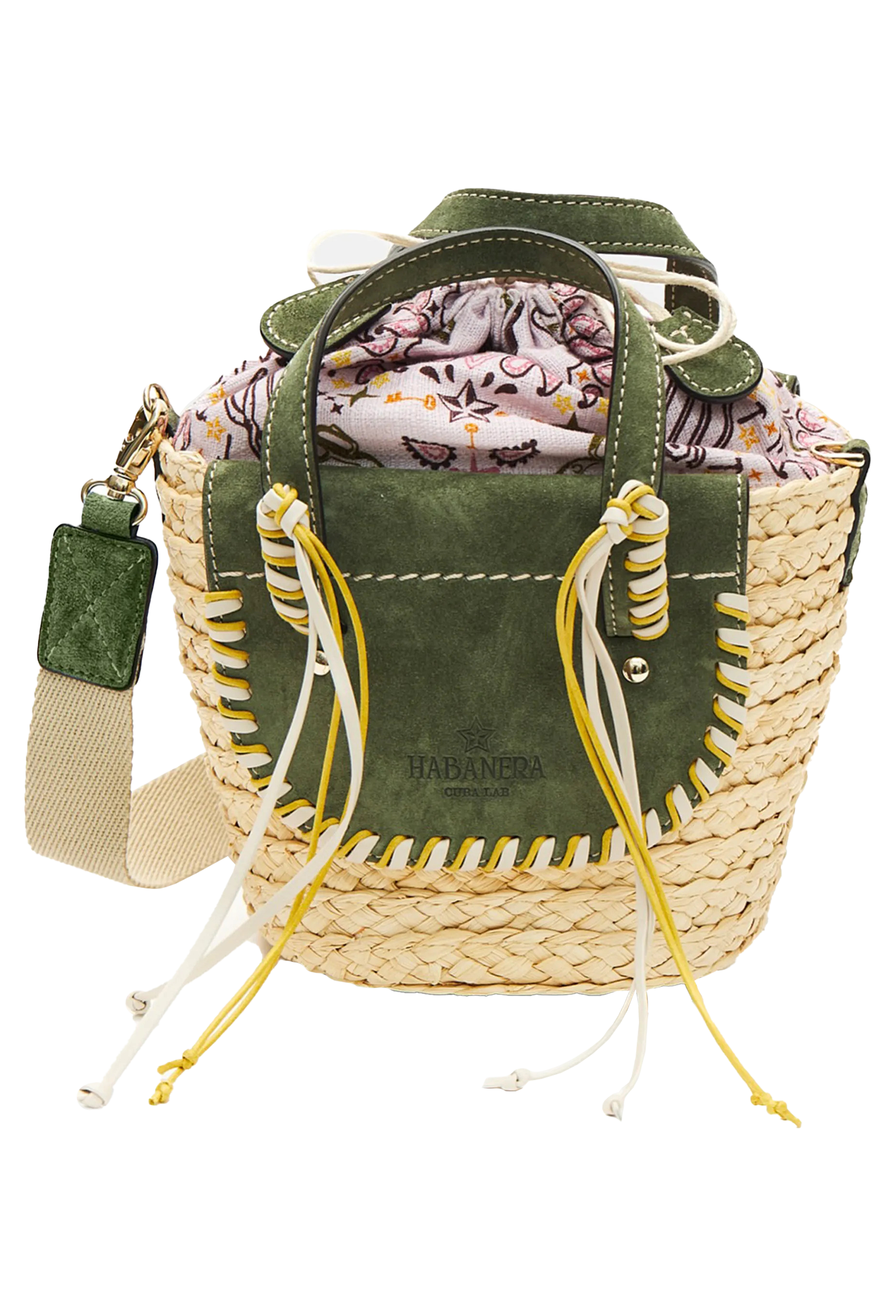 A mini basket bag with green leather flaps, yellow and white cord detailing, and two small leather handles and a crossbody strap. Transparent background.