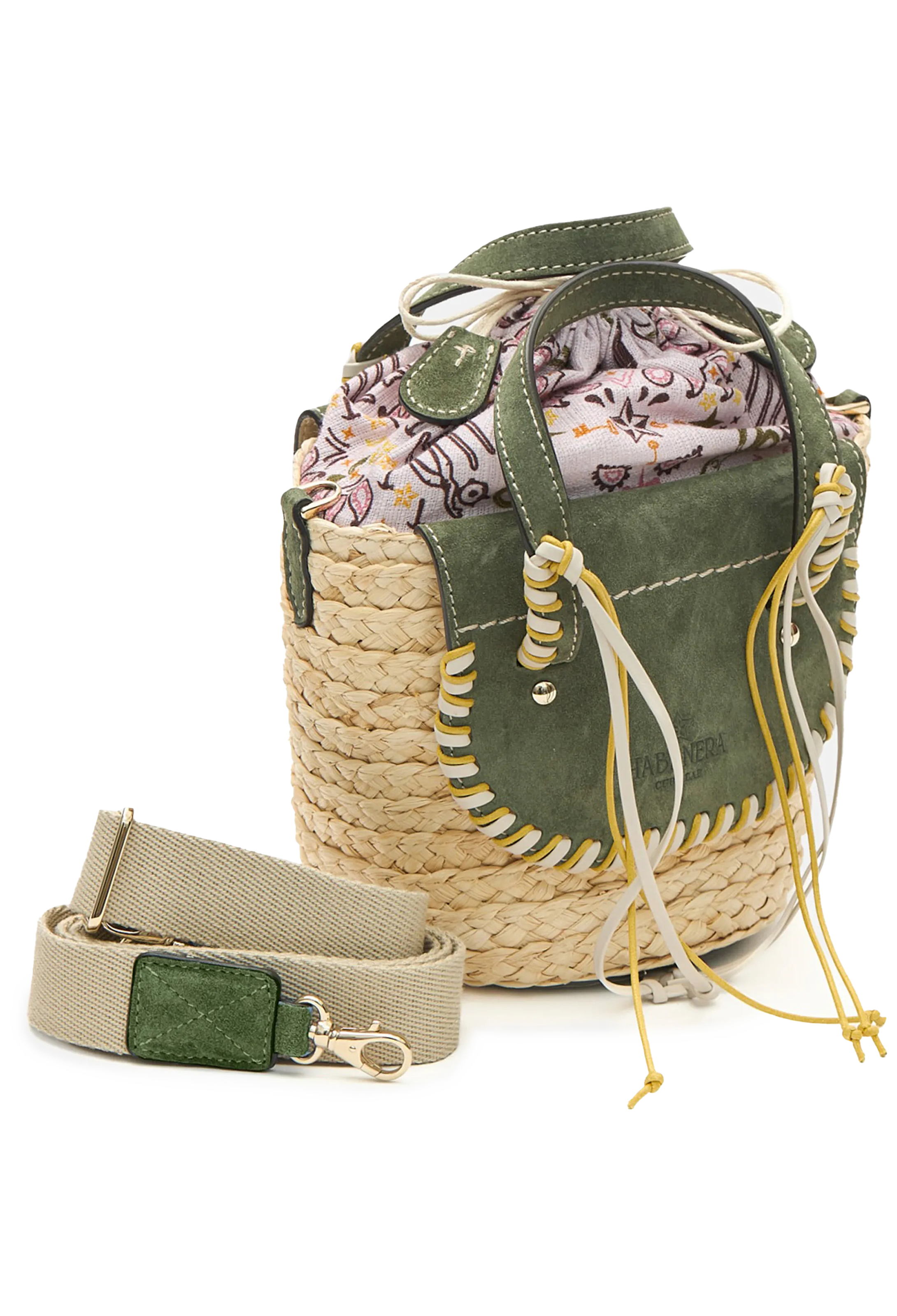 A mini basket bag with green leather flaps, yellow and white cord detailing, and two small leather handles and a crossbody strap. Transparent background.