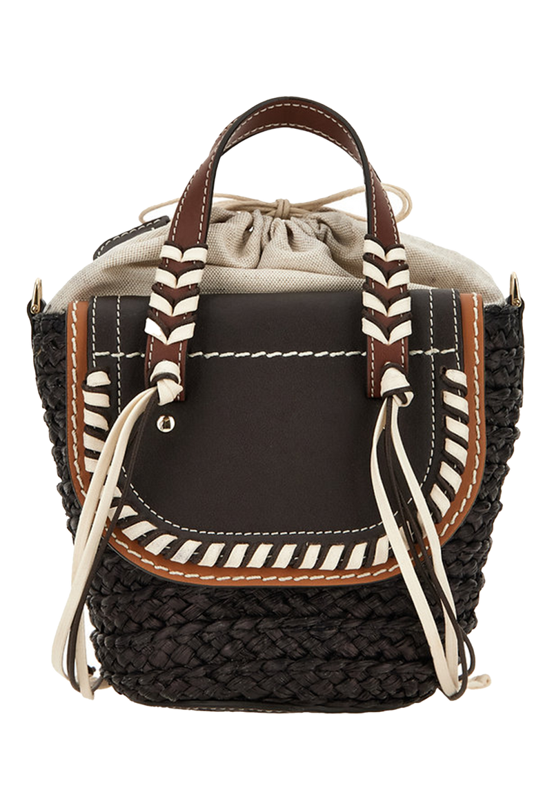 The back of a dark brown mini basket bag with leather flaps, brown and white cord detailing, and two small leather handles and a crossbody strap. Transparent background.