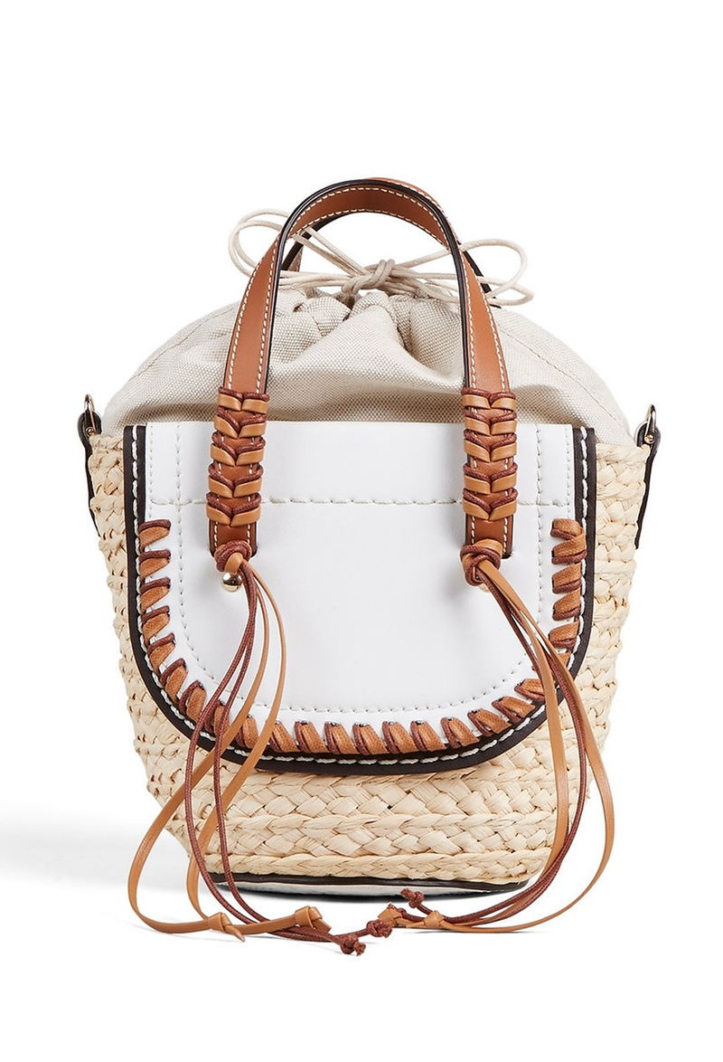 The back of a mini basket bag with white leather flaps, brown cord detailing, and two small leather handles and a crossbody strap. Transparent background.