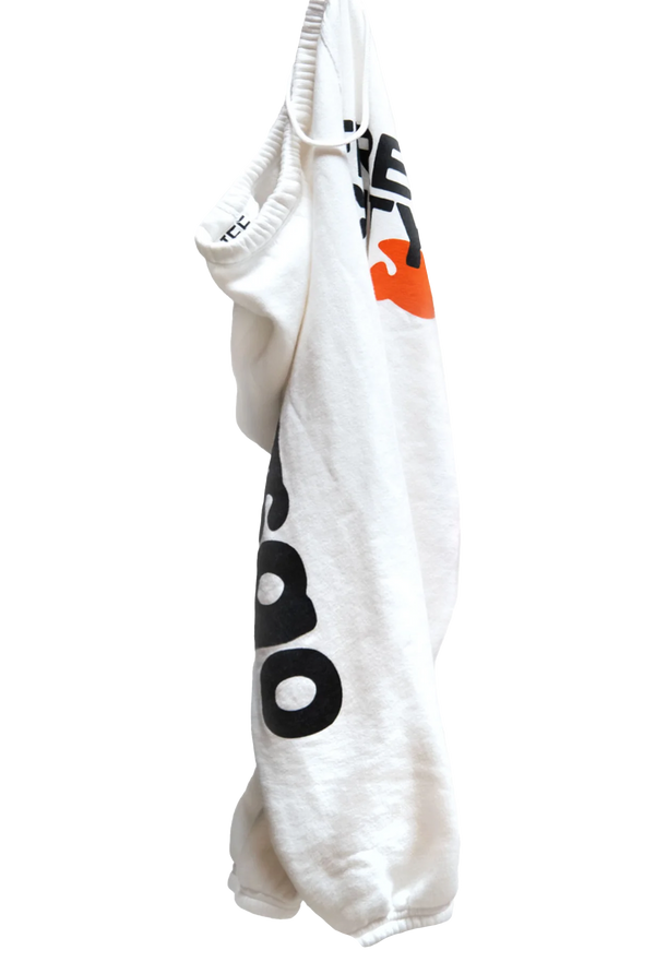A pair of white sweatpants with letsgo and free city printed in black lettering and an orange dove graphic. Transparent background.